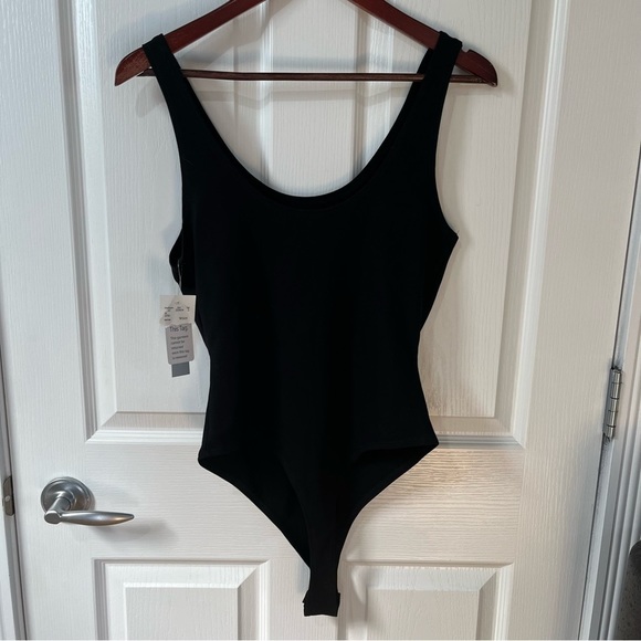 Jo & Co black one piece body suit snap closure and thong back size large - Picture 5 of 10